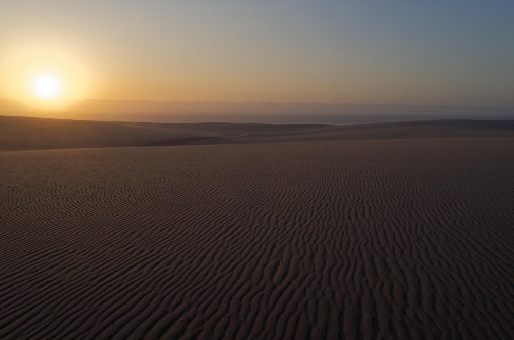 Sundowner über den Dünen